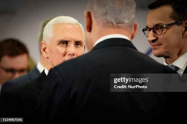 Vice President Mike Pence is seen speaking with Israeli PM Benjamin Netanyahu at the National Stadium in Warsaw, Poland on February 14, 2019 during...