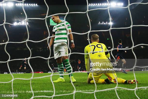 Emilio Izaguirre of Celtic looks on after Celtic concede their second goal during the UEFA Europa League Round of 32 First Leg match between Celtic...
