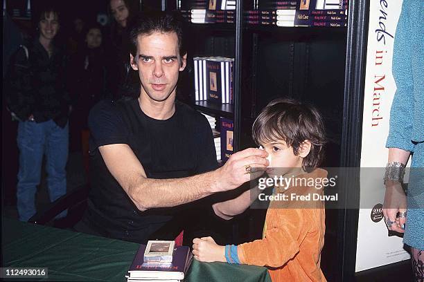 Nick Cave with his son Luke during Nick Cave "King Ink II" Book Signing - March 1, 1997 at Waterstones in London, Great Britain.