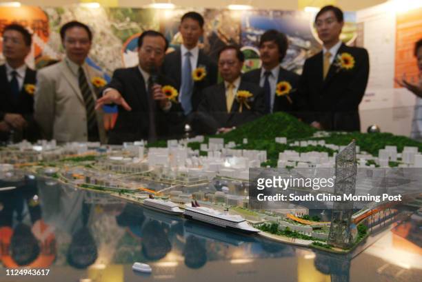 Democratic Alliance for the Betterment and Progress of Hong Kong Chan Kam-lam introduces the DAB's model on Kai Tak redevelopment to New World...