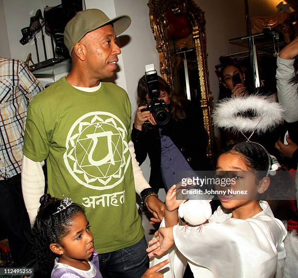 Aoki Lee Simmons ,Russell Simmons and Ming Lee Simmons