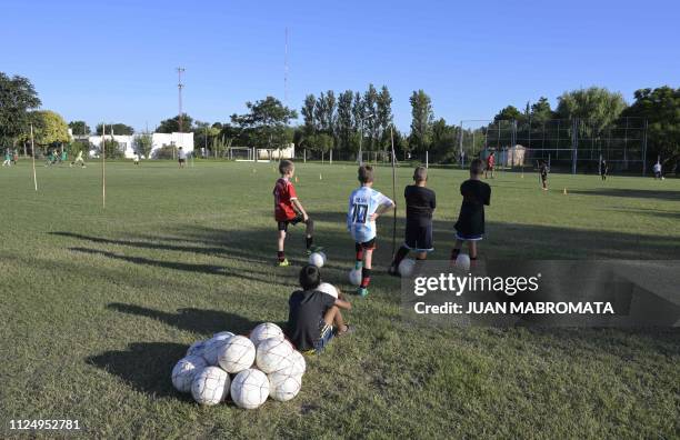 Boys train at the Club Atletico y Social San Martin, where the wake of late Argentine footballer Emiliano Sala will take place, in Progreso, Santa...