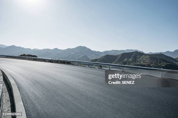 road background - crash barrier stock pictures, royalty-free photos & images