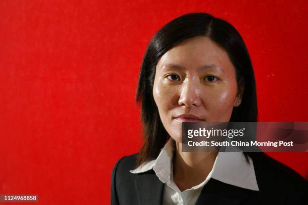 Pictured is prison warden Candy Leung in her work uniform. This is for a feature story about the plight of prison wardens. They are under a lot of...