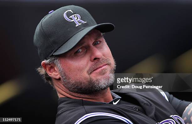 Jason Giambi of the Colorado Rockies looks on from the dugout prior to facing the Chicago Cubs at Coors Field on April 17, 2011 in Denver, Colorado.
