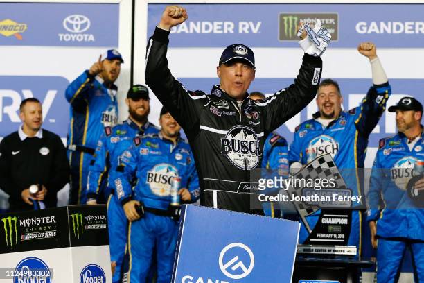 Kevin Harvick, driver of the Busch Beer Car2Can Ford, celebrates in victory lane after winning the Monster Energy NASCAR Cup Series Gander RV Duel At...