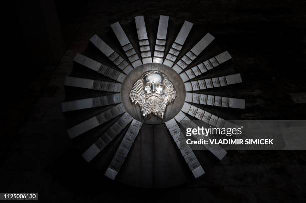 Picture taken on January 13, 2019 shows a sculpture of Russian chemist Dmitri Mendeleev. The monument made of milled stainless steel by sculptor...
