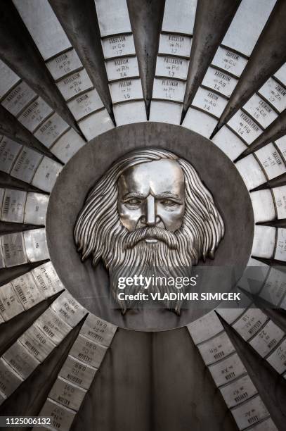 Picture taken on January 13, 2019 shows a sculpture of Russian chemist Dmitri Mendeleev. The monument made of milled stainless steel by sculptor...