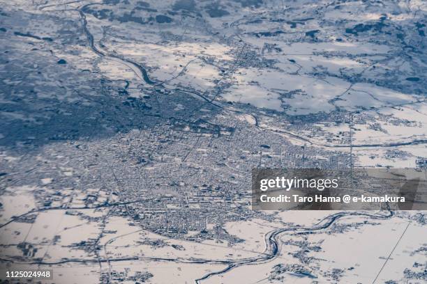 hirosaki city in aomori prefecture in japan daytime aerial view from airplane - aomori - fotografias e filmes do acervo