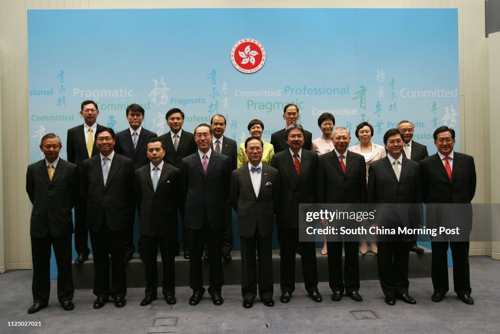 Chief Executive Donald Tsang Yam-kuen (Central) with his appointment of Principal Officials under the Accountability System for the third term of the HKSAR Government meet the media at the Central Government Offices, Central. 23 June 2007 (back row, L