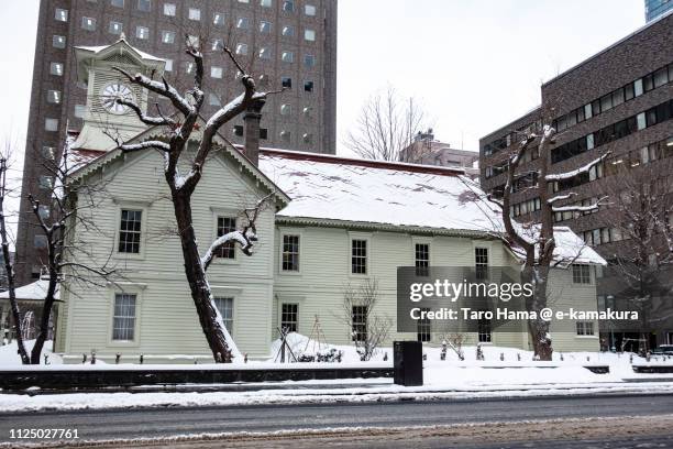 sapporo clock tower in sapporo city in hokkaido in japan - sapporo clock tower stock pictures, royalty-free photos & images