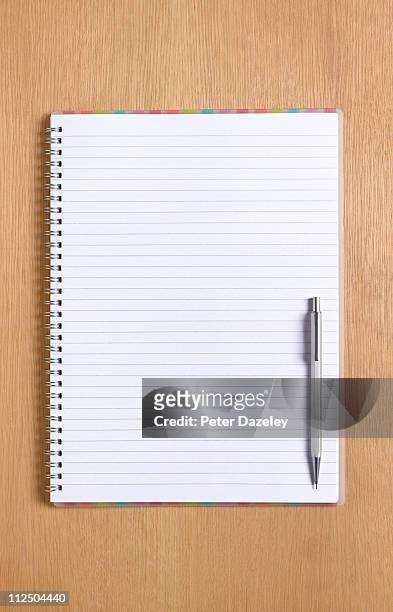 notepad and pen with copy space - spiral bound stock pictures, royalty-free photos & images