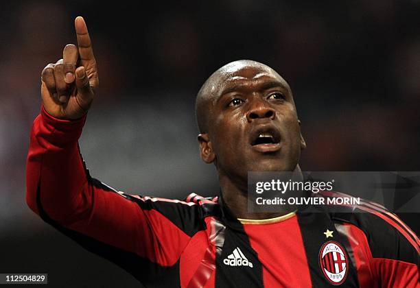 Milan's Dutch midfielder Clarence Seedorf celebrates after scoring against Parma during their Italian Serie A football match on February 12, 2011 in...