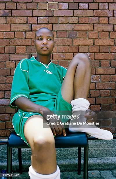 Mnsisi a player of the Chosen Few women's football team, sits in the courtyard of the former Women's Goal in Constitution Hill, where FEW has its...