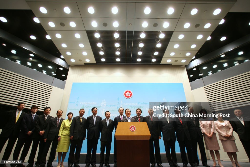 Chief Executive Donald Tsang Yam-kuen (M) with his appointment of Principal Officials under the Accountability System for the third term of the HKSAR Government meet the media at the Central Government Offices, Central. (L-R) Norman Chan Tak-lam, Secreta
