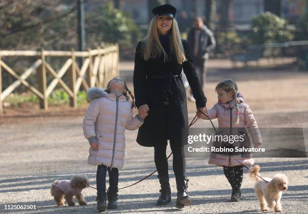 Michelle Hunziker is seen with her daughters Sole Trussardi and Celeste Trussardi in the park on February 15, 2019 in Milan, Italy.