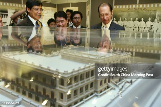 Stanley Ho Hung-sun watch a model of Queen's College at Hollywood Road in "Queen's College.Hong Kong.China: History and Memories of 145 Years"...