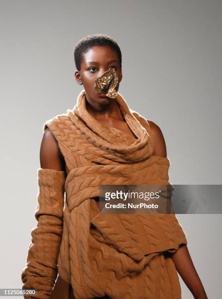 Model walks the runway at the Marta Jakubowski show during London Fashion Week February 2019 at the BFC Show Space on February 15, 2019 in London,...