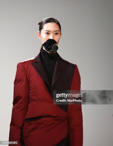 Model walks the runway at the Marta Jakubowski show during London Fashion Week February 2019 at the BFC Show Space on February 15, 2019 in London,...