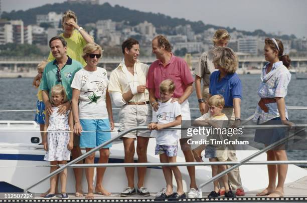 Diana, Princess of Wales enjoys a summer holiday in Majorca on board King Juan Carlos of Spain's yacht 'Fortuna', Spain, 15 August 1990. From left:...