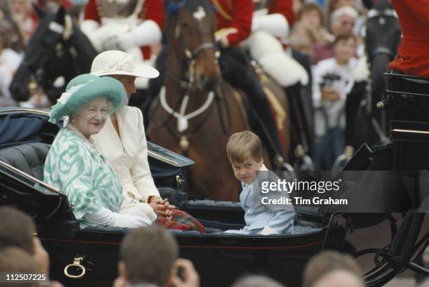 The Queen Mother , Diana, Princess of Wales and Prince William riding in a horsedrawn carriage at the Trooping the Colour ceremony, in London,...