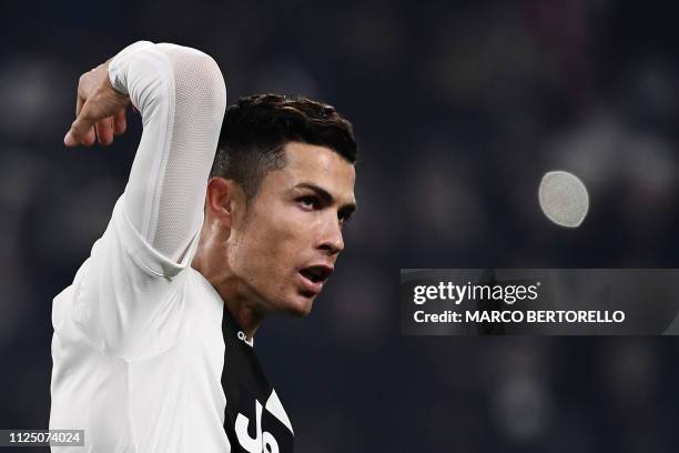 Juventus' Portuguese forward Cristiano Ronaldo celebrates after scoring during the Italian Serie A football match Juventus vs Frosinone on February...