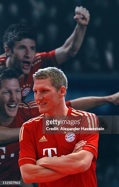 Bastian Schweinsteiger poses in the new FC Bayern Muenchen home jersey for the season 2011/12 at Allianz Arena on April 19, 2011 in Munich, Germany.