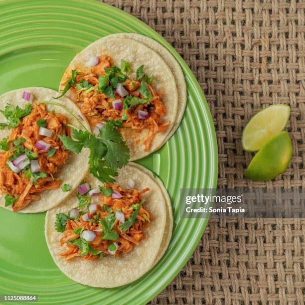 top view of three tacos - tortilla stock-fotos und bilder