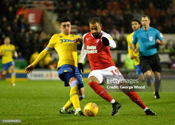 Pablo Hernandez of Leeds United tackles Kyle Vassell of Rotherham United during the Sky Bet Championship match between Rotherham United and Leeds...
