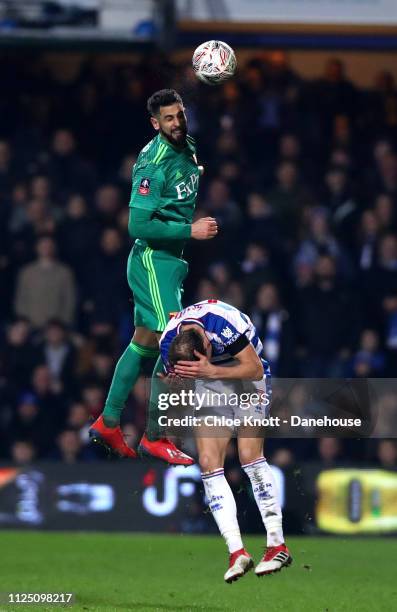 Miguel Britos of Watford FC and Matt Smith of Queens Park Rangers in action during the FA Cup Fifth Round match between Queens Park Rangers and...