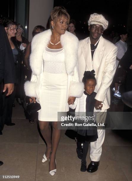 Singer Whitney Houston, singer Bobby Brown and daughter Bobbi Kristina Brown attend the Fourth Annual International Achievement in Arts Awards on...
