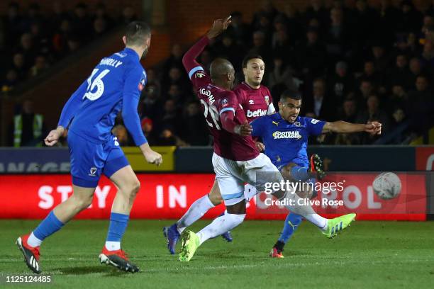 Kwesi Appiah of AFC Wimbledon scores his team's first goal during the FA Cup Fourth Round match between AFC Wimbledon and West Ham United at The...