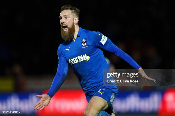 Scott Wagstaff of AFC Wimbledon celebrates after scoring his team's second goal during the FA Cup Fourth Round match between AFC Wimbledon and West...