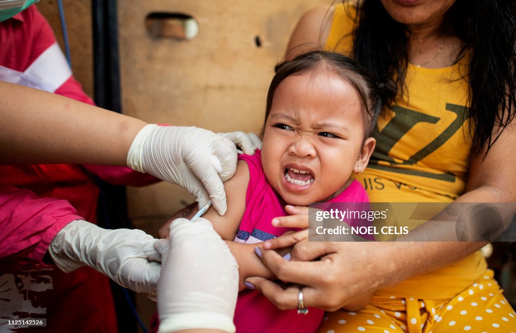 TOPSHOT-PHILIPPINES-HEALTH-MEASLES-VACCINATION