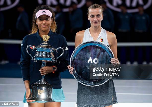 Naomi Osaka of Japan and Petra Kvitova of the Czech Republic pose for photos with their trophies on day 13 of the 2019 Australian Open at Melbourne...