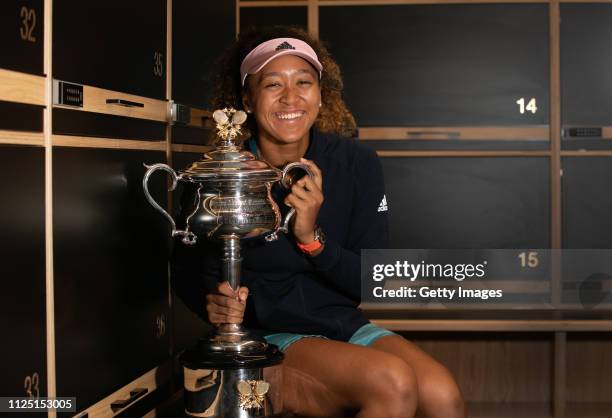 In this handout image provided by Tennis Australia, 2019 Australian Open Women's Singles Final Winner Naomi Osaka of Japan poses with the Daphne...