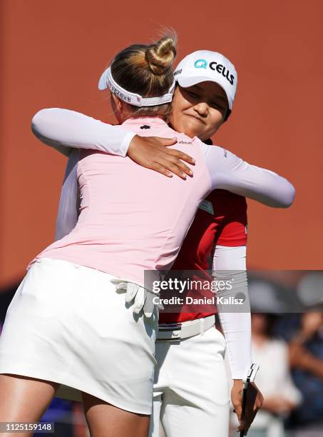 Lr Nelly Korda of the United States and Haru Nomura celebrate after the 18th hole during day three of the 2019 ISPS Handa Women's Australian Open at...