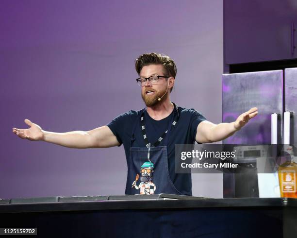 Chef Richard Blais gives a cooking demonstration during the sold out inaugural KAABOO Cayman Festival at Seven Mile Beach on February 15, 2019 in...