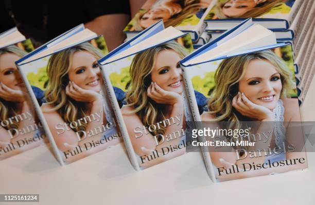 Copies of adult film actress/director Stormy Daniels' book "Full Disclosure" are displayed during a signing at the 2019 AVN Adult Entertainment Expo...