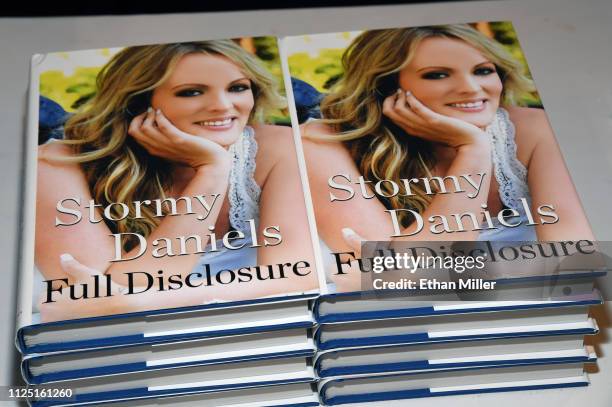 Copies of adult film actress/director Stormy Daniels' book "Full Disclosure" are displayed during a signing at the 2019 AVN Adult Entertainment Expo...