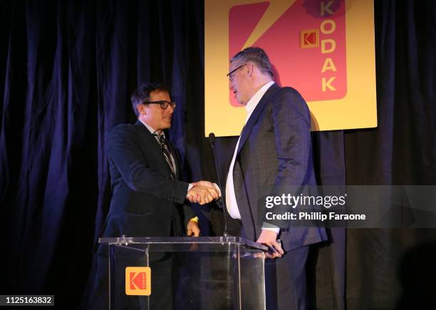 Adam McKay accepts the 2019 Lifetime Achievement Award from David O. Russell onstage during the 3rd annual Kodak Awards at Hudson Loft on February...