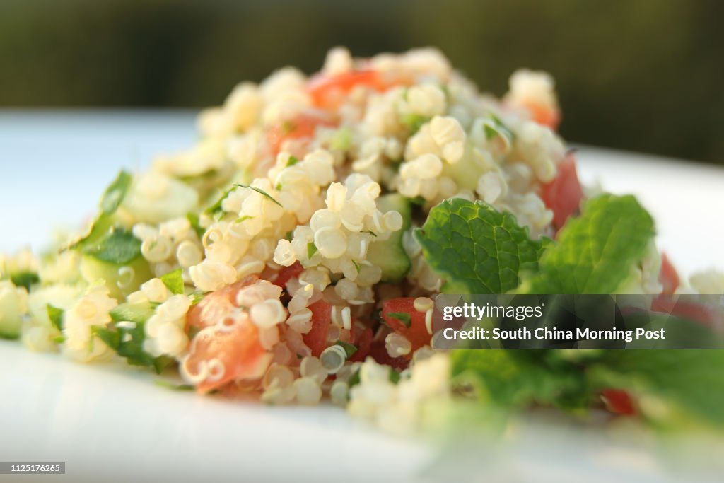 For SCMP Health Post feature on quinoa: Gourmet raw food chef Dr Wendy Yang whips up a quinoa tabbouleh. To take photo of the dish at her home, Sha Kok Mei Village, Sai Kung, 07APR11.