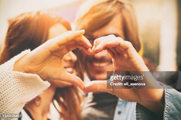 heart shape from couple hands, istanbul - love stock pictures, royalty-free photos & images