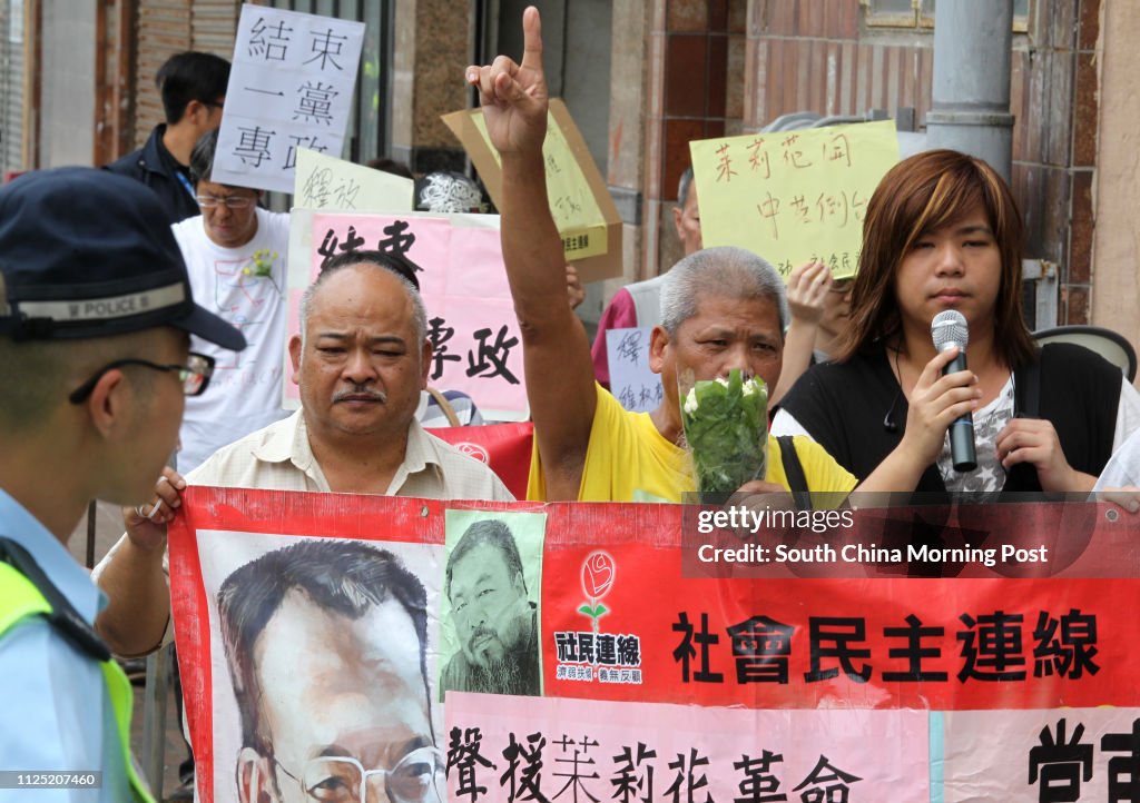 League of Social Democrats' member march to Liaison Office in support of mainland Jasmine Revolution. Connaught Road West. 17JUL11.