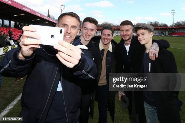 Phil Neville, England Women's manager and Salford City Co-Owner takes a selfie photograph with Salford City Co-Owner David Beckham, Romeo James...