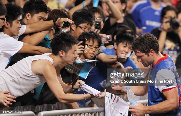 Blackburn Rovers team no.8 David Dunn signs autographs for fans after Barclays Asia Trophy Final - Kitchee vs Blackburn Rovers at Hong Kong Stadium....