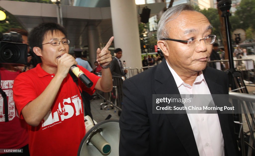 Raphael Wong Ho-ming of LSD shouts slogans at Head of the Central Policy Unit Professor Lau Siu-kai as he attends a Regional Consultation Forum on Policy Address and Budget at Science Museum at Tsim Sha Tsui. 25AUG11