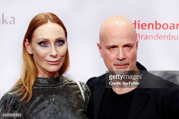 German actress Andrea Sawatzki and her husband German actor Christian Berkel attend the Medienboard Berlin-Brandenburg Reception on the occasion of...