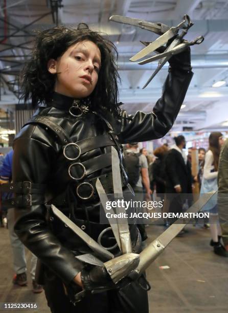 Visitor dressed as 'Edward Scissorhands' attends the Paris Manga and Sci-fi show at the Porte de Versailles, in the southwest of Paris, on February...