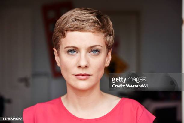 portrait of woman at home - short hair stock pictures, royalty-free photos & images